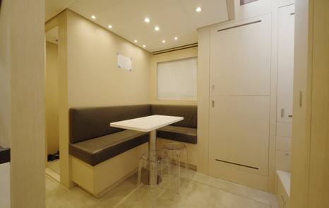Crew mess on the Sanlorenzo SHE with bench seating and table