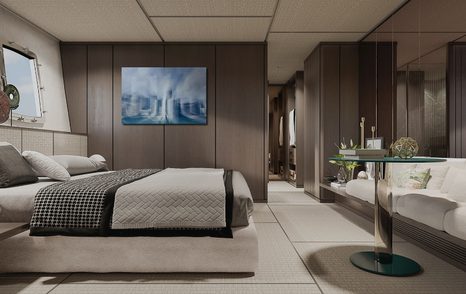 Master cabin onboard Sanlorenzo SX112 crossover yacht, central berth to port side, facing plush seating