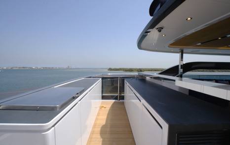 Outdoor bar on the Gulf Craft Majesty 145 sundeck with extensive worktops and storage