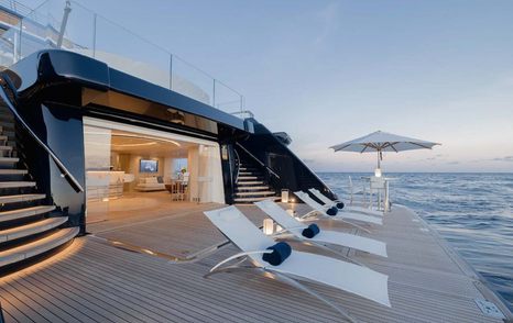 Superyacht Here Comes The Sun beach club with loungers