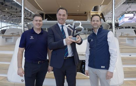 yachtBuyer trophy handover Jack Haines, Will Green (CEO of Princess Yachts) and Kevin Bodington