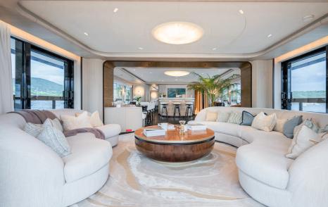 Expedition yacht M's main saloon with curved seating