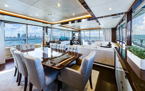 Sunseeker 95 yacht Pure Vida main salon forward dining area 