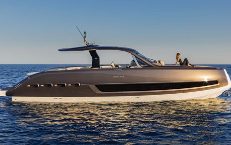 Invictus TT460 motor yacht at anchor side view