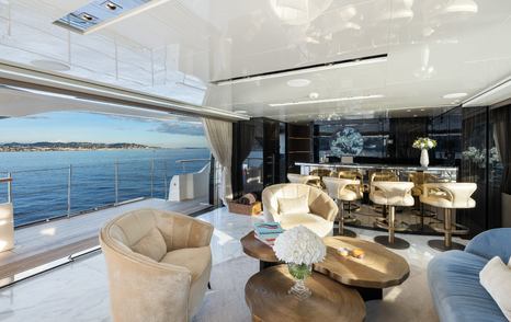 Superyacht SabBaTiCal skylounge view out over balcony with door wide open