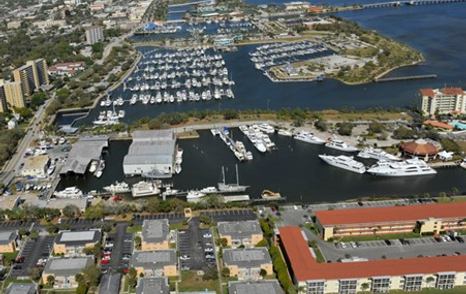 Aerial view of Daytona Marina & Boat Works – Daytona Beach, multiple yachts moored, surrounded by sea and marina facilities