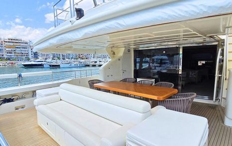 Bleu Blanc aft deck with seating and dining table