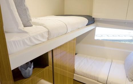 Riviera-78-Motor-Yacht-Enclosed-Bridge-Deck-Review-bunk-cabin