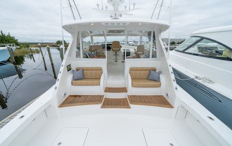 Viking 54SC sportsfisher yacht cockpit with integrated wooden seating 