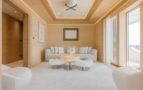 Superyacht Here Comes The Sun's lounge with curved sofa