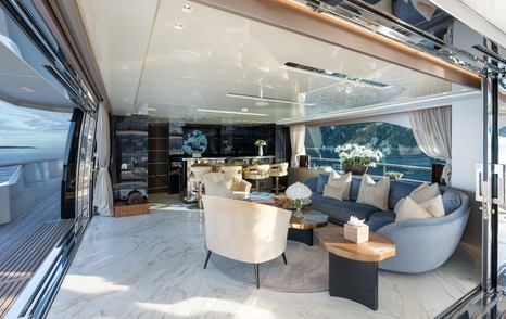 Superyacht SabBaTiCal skylounge with plush carpet and cosy seating