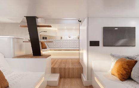 Maxim Yachts MAX43 Comfort boat interior with mounted TV and white seating