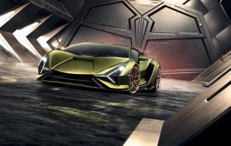 Front on view of Lamborghini Sián FKP 37 supercar, surrounded by enclosed metallic structure