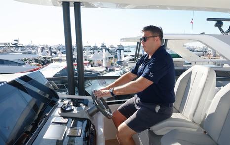 Pearl 73 flybridge driving position with adjustable helm seats