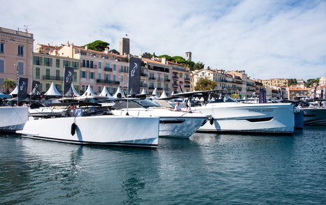 A line of boats berthed at the Cannes Yachting Festival