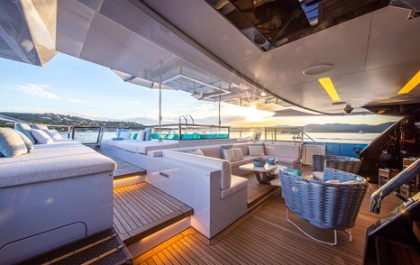 Superyacht Oceanbird's outdoor lounging area and jacuzzi