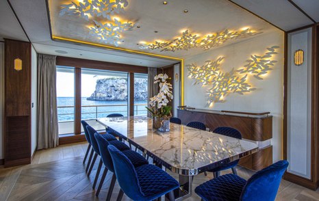 Superyacht Delta One's main saloon dining table