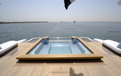 Infinity pool on the Gulf Craft Majesty 145 beach club with views across the stern