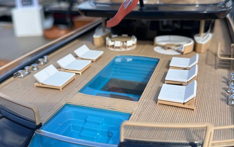 Close up of model superyacht Breakthrough aft infinity pool