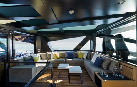 Wally wallywhy200 motor yacht upper deck seating area with U-shaped seating behind helm station