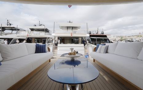 Sanlorenzo SHE cockpit with opposing sofas and central table