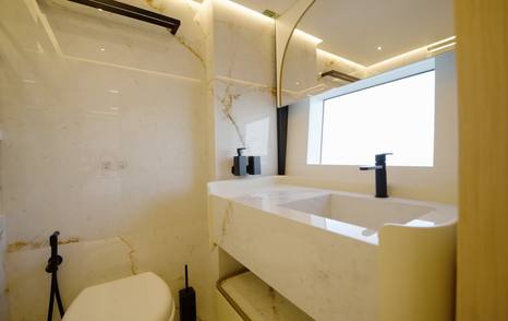 Ensuite bathroom serving a twin guest cabin aboard the Gulf Craft Majesty 100 Terrace