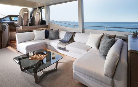 Princess Y72 motor yacht interior U-shaped grey seating