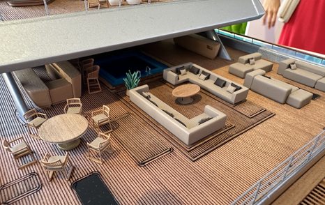 Scale model of superyacht DRAGONFLY showing exterior lounge and dining areas