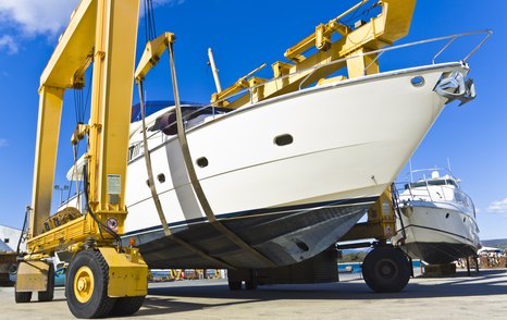 crane lift out of a yacht for a yacht survey