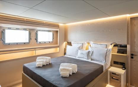 Numarine 40MXP double guest cabin with queen-size bed and opening portlights