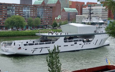 Support yacht U-81 navigating river 