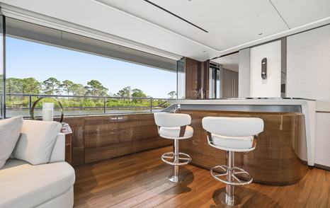 Princess Y95 Motor Yacht Just Perfect main salon wooden bar area 