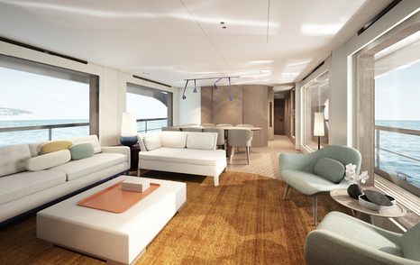 Maon salon onboard Azimut Grande 26 Metri, angular seating situated around edges facing in towards low down coffee table. Large windows surrounding. 