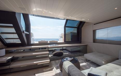 Bluegame BGX63 boat interior leading to water level aft deck 