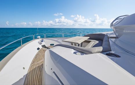 Sunseeker 95 yacht Pure Vida foredeck with grey U-shaped seating