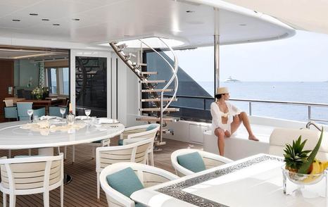 Superyacht Philosophy aft deck circular dining table 