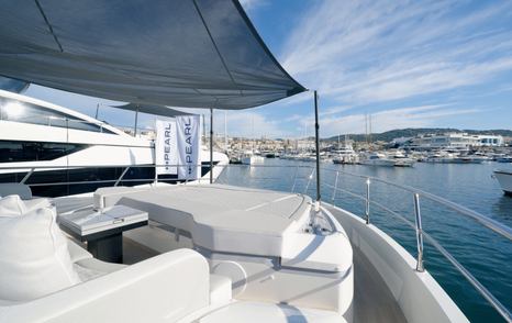 Pearl 73 foredeck lounge beneath the pop-up sunshade