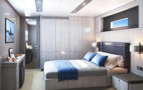 The cabins onboard the Adventure 780 are bright and spacious, and come complete with bedside tables and a small dresser