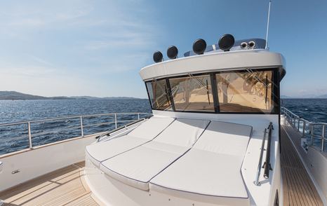 Nord Star 49+ motor yacht foredeck with grey sunpads 