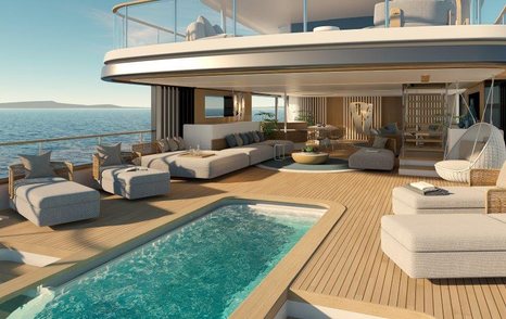 The veranda deck onboard the Benetti Motopanfilo 45M boasts a large swimming pool and free-standing, neutral-colored furniture 