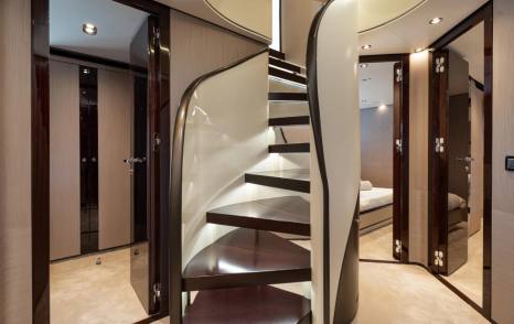 Motor yacht Dambar spiral staircase to cabins