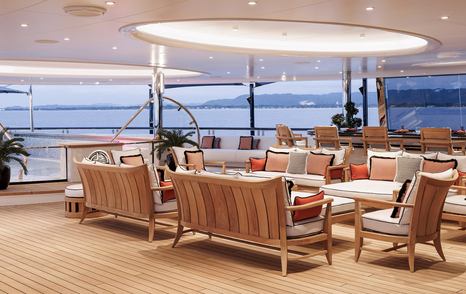 Superyacht Ahpo aft deck shaded seating and infinity pool