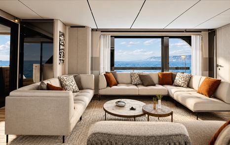 Rendering of Ferretti INFYNITO 100 Superyacht salon with L-shaped seating 