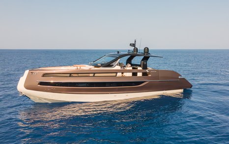  Invictus TT550 motor yacht at anchor side view