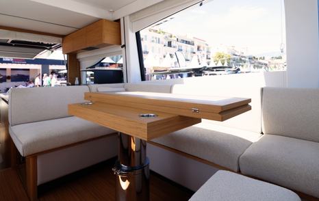 Solaris-Power-60-Coupe-Review-saloon-dinette-with-adjustable-table-and-side-window