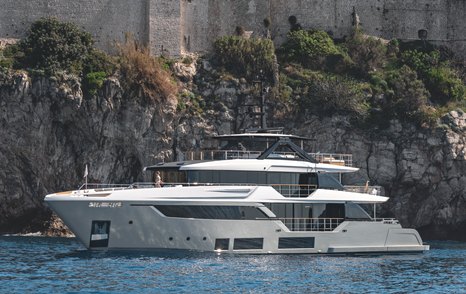 Custom Line Navetta 38 side profile showing displacement hull, large windows and multi-deck superstructure