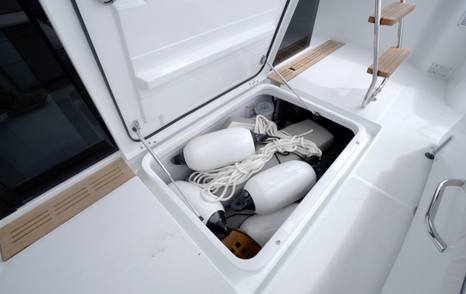 Large lazarette storage locker beneath the cockpit sole on the Beneteau Swift Trawler 37 Fly
