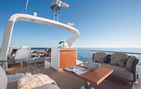 the upper deck of a flybridge yacht