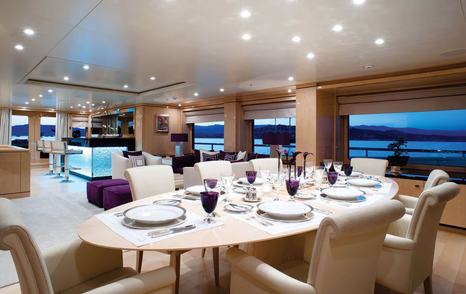Amels superyacht Step One upper saloon bar and dining area 