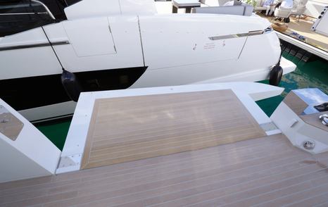 Pearl 73 fold-down cockpit balcony with teak decking